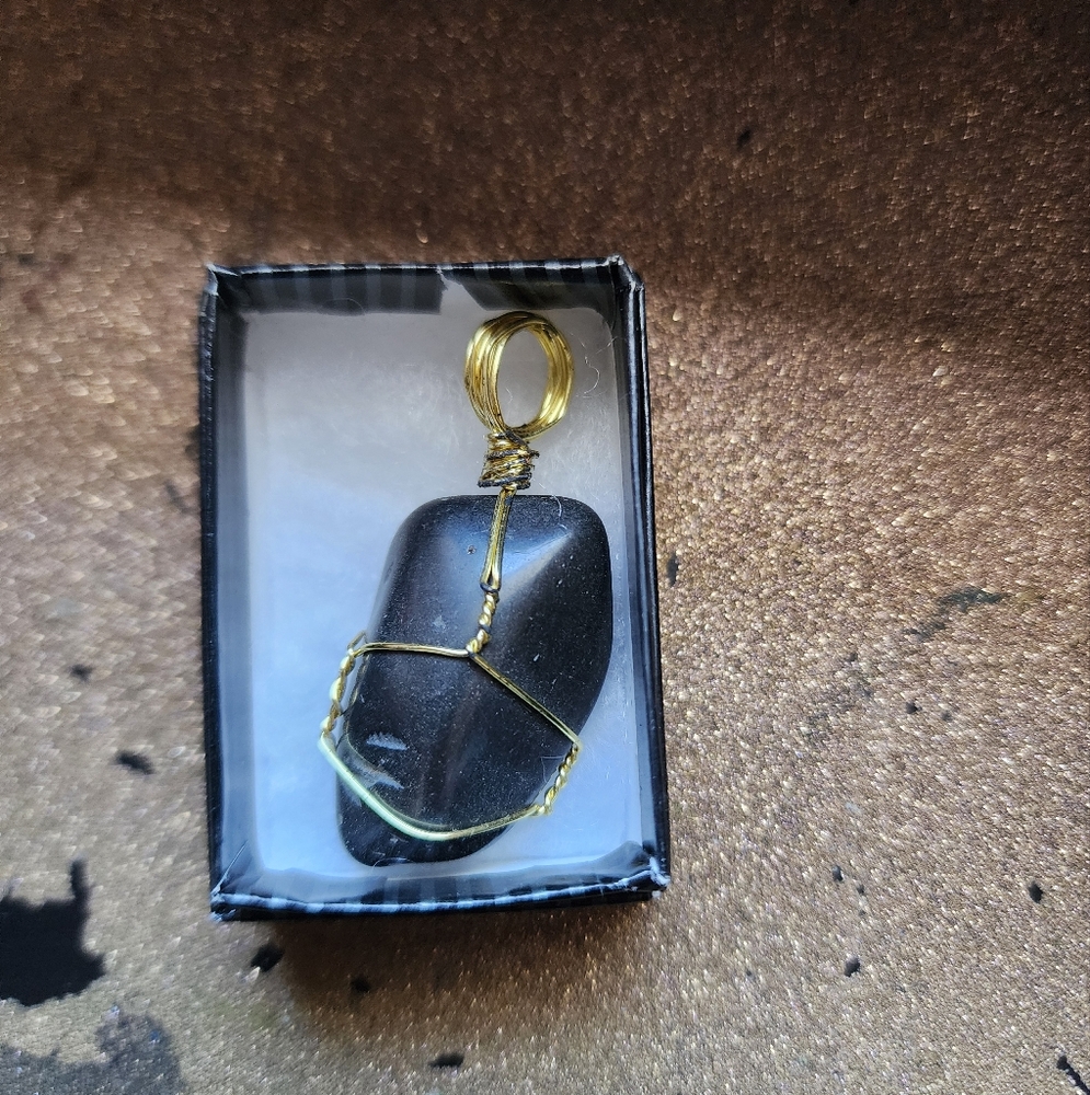 Black Stone Pendant with Gold Wire Wrap